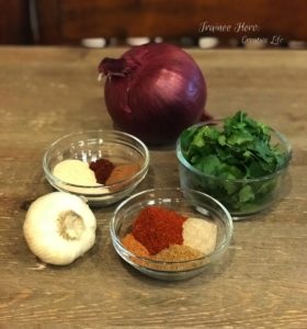 Spices, onion, garlic, cilantro